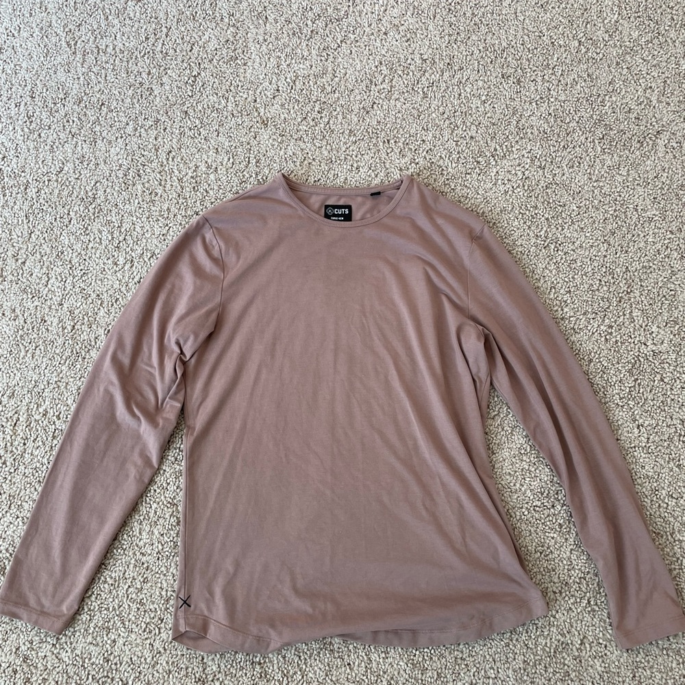 Cuts Men long-sleeve tee in light purple.